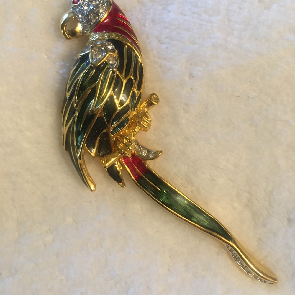 Brooch. green and red enamel and crystals. Approx 2” long.